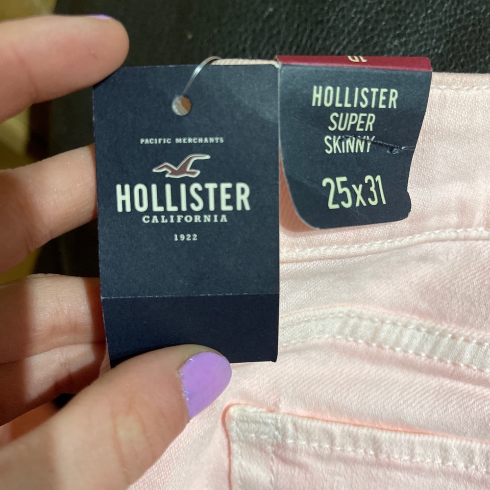Hollister pink faded skinny jeans
